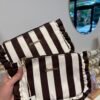 Make-up tasje 'Stripes with ruffle'